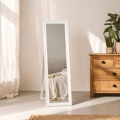 White framed urban white floor standing mirror showing full-length reflection in a sleek modern design
