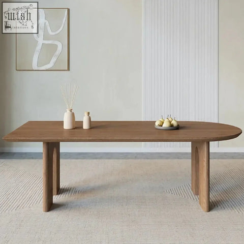 A sleek light brown wooden uta dining table with a smooth finish and sturdy tapered legs for dining table use