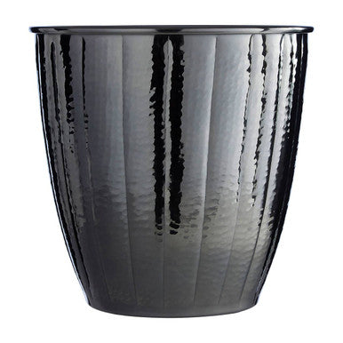Black hammered metal ice bucket with vertical ridges and sleek modern design in black nickel finish
