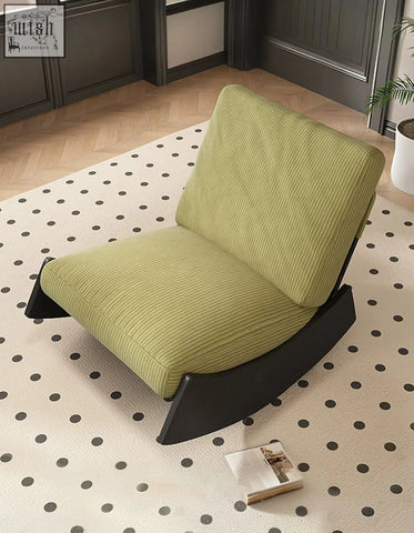 Valdez rocking lounge chair in lime green corduroy with a sleek black wood frame rocking chair design