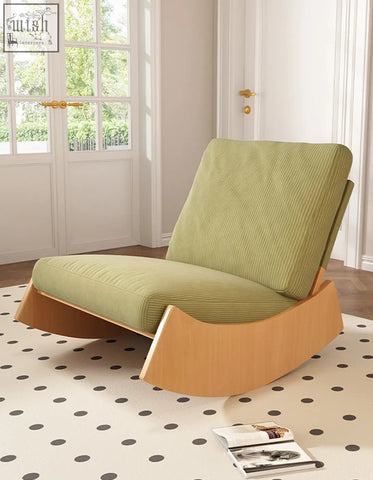 Valdez rocking lounge chair in light green corduroy with a smooth wooden base perfect for relaxing rocking chairs