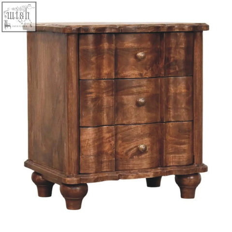 Dark brown valencia bedside table with three drawers and brass knobs made from solid mango wood