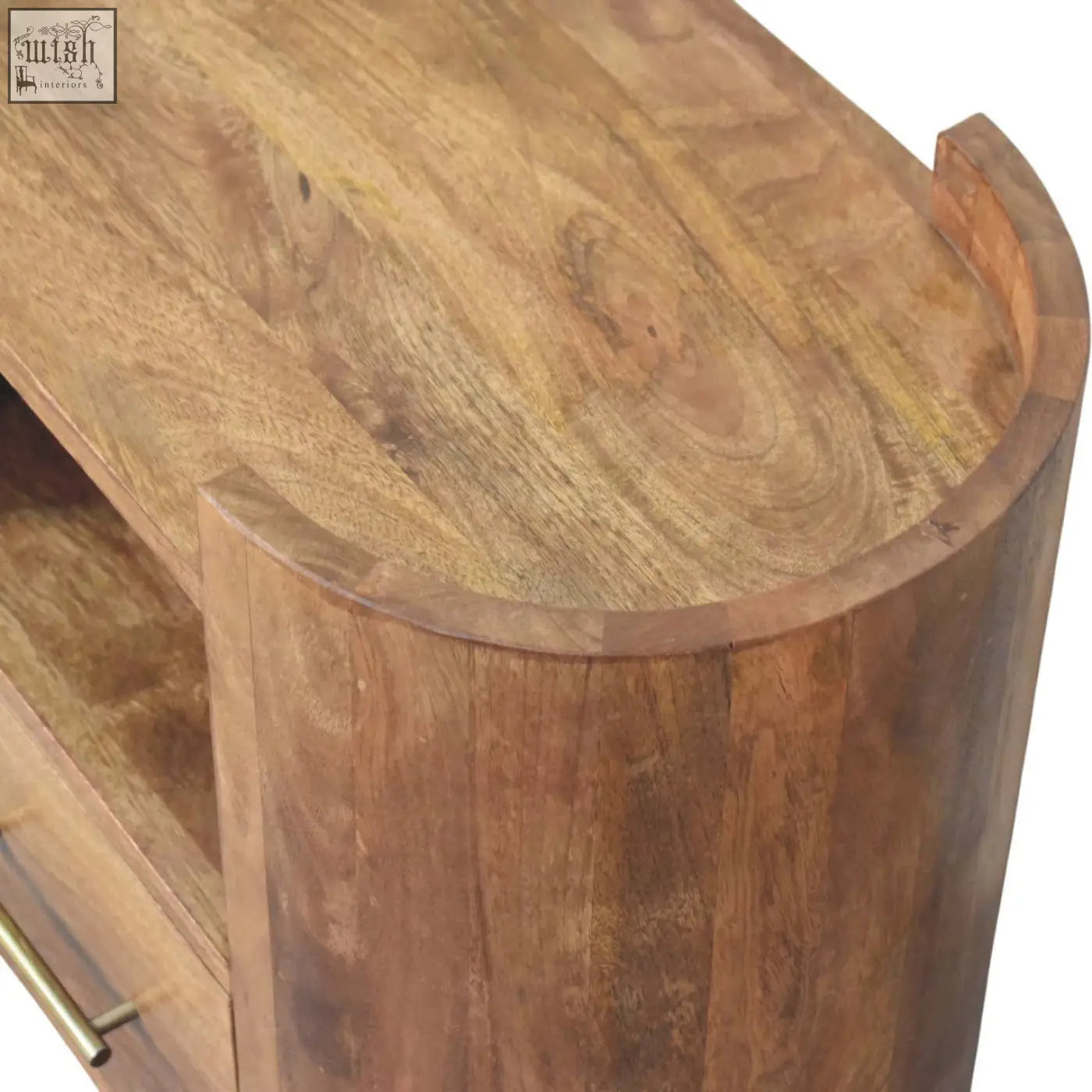 A warm medium brown wooden valencia sculpted bedside console table with a curved top and natural wood grain