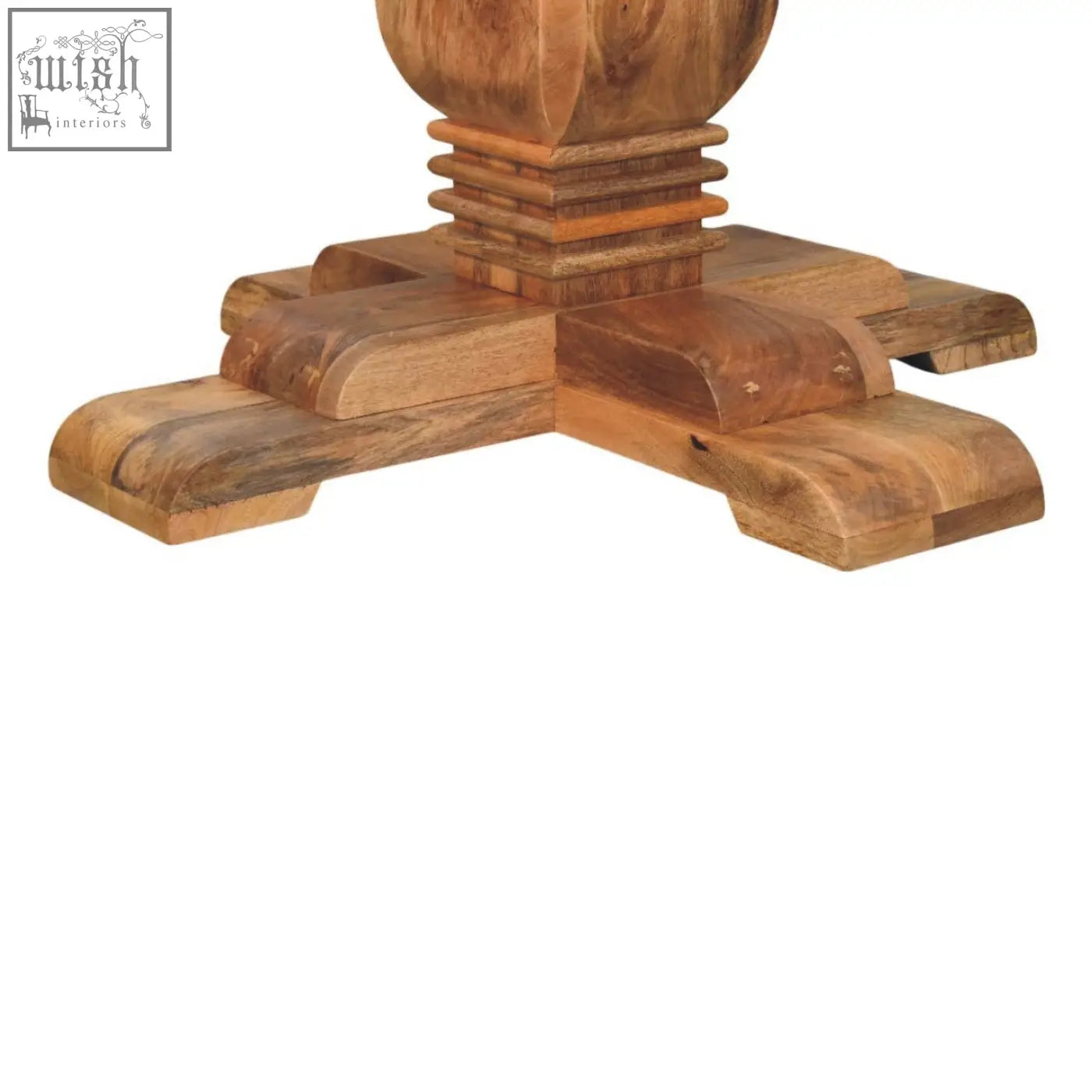 Solid wood pedestal base with warm natural finish and intricate carvings for valentina round dining table
