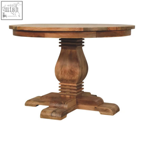 Valentina round dining table with a rustic medium-brown wooden finish and ornate pedestal base perfect for round dining
