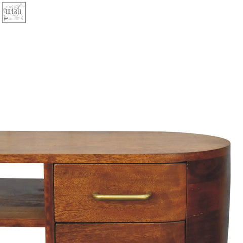 A warm-toned wooden valenza curved media unit with a curved top and brass drawer handle