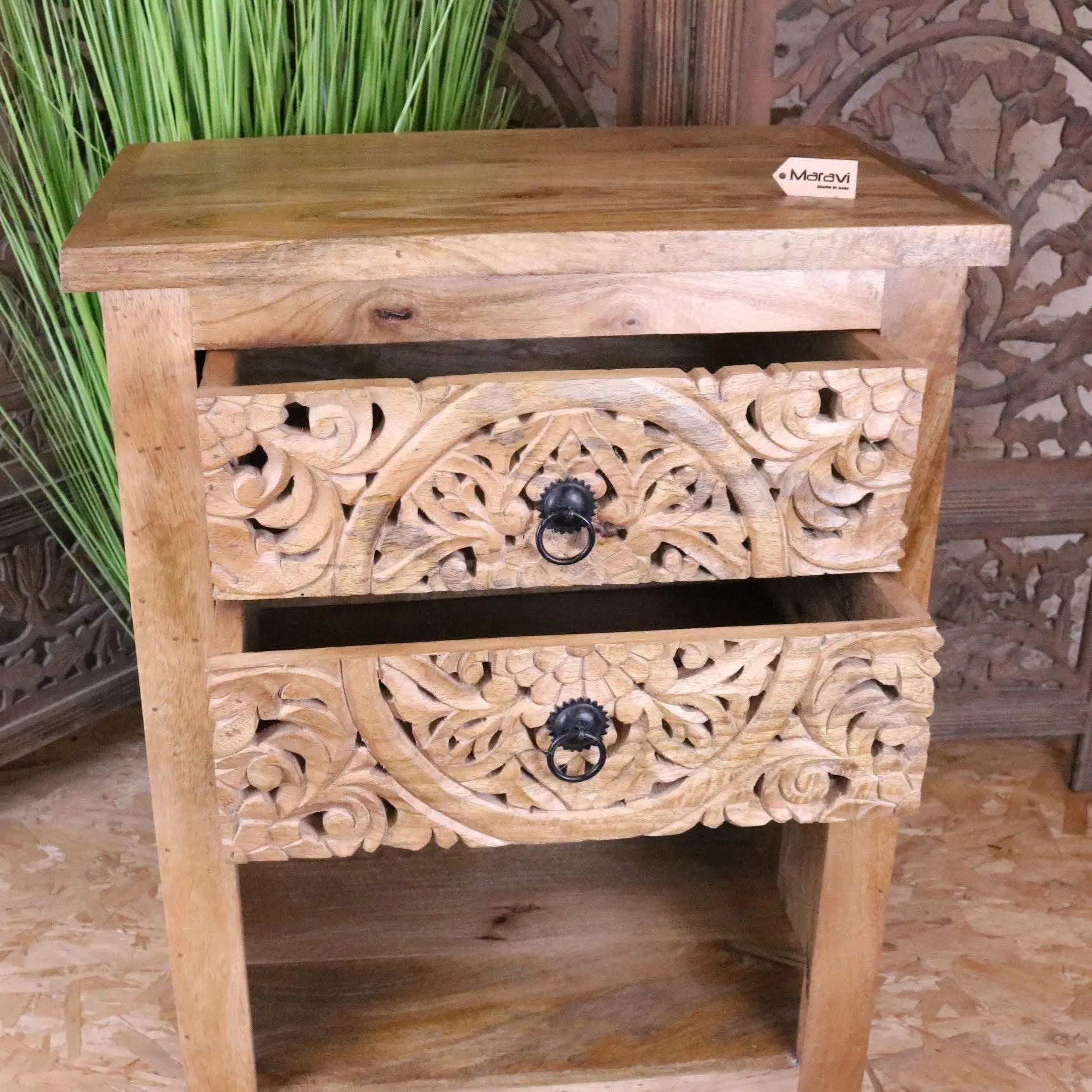 Hand carved wooden vansura carved bedside table with intricate floral patterns and black ring pulls 2 drawer bedside table