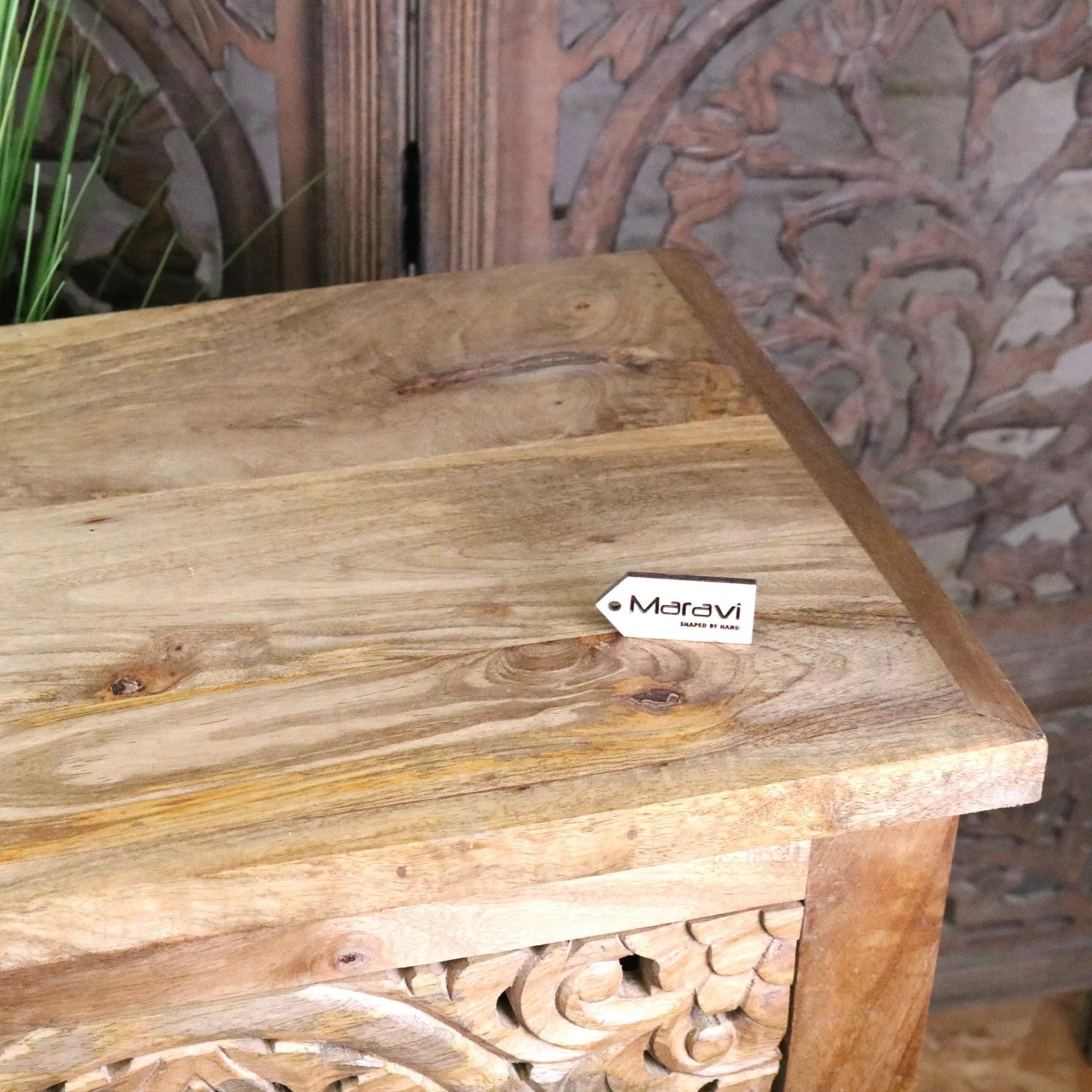 Rustic wooden vansura carved bedside table with natural finish and intricate carvings perfect as a bedside table