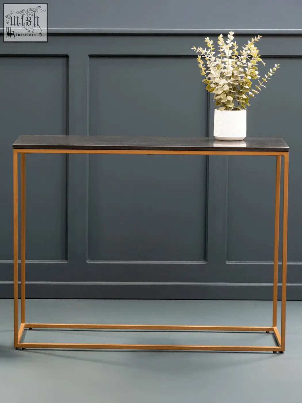 Varana black marble console table with a sleek black marble top and gold iron frame for stylish entryways