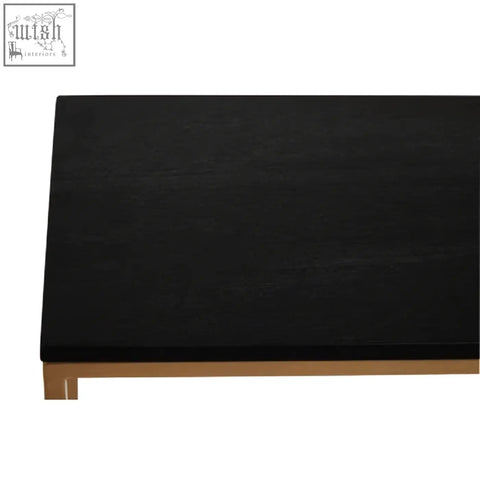 Black wooden shelf with gold iron frame legs as part of varana black marble console table design