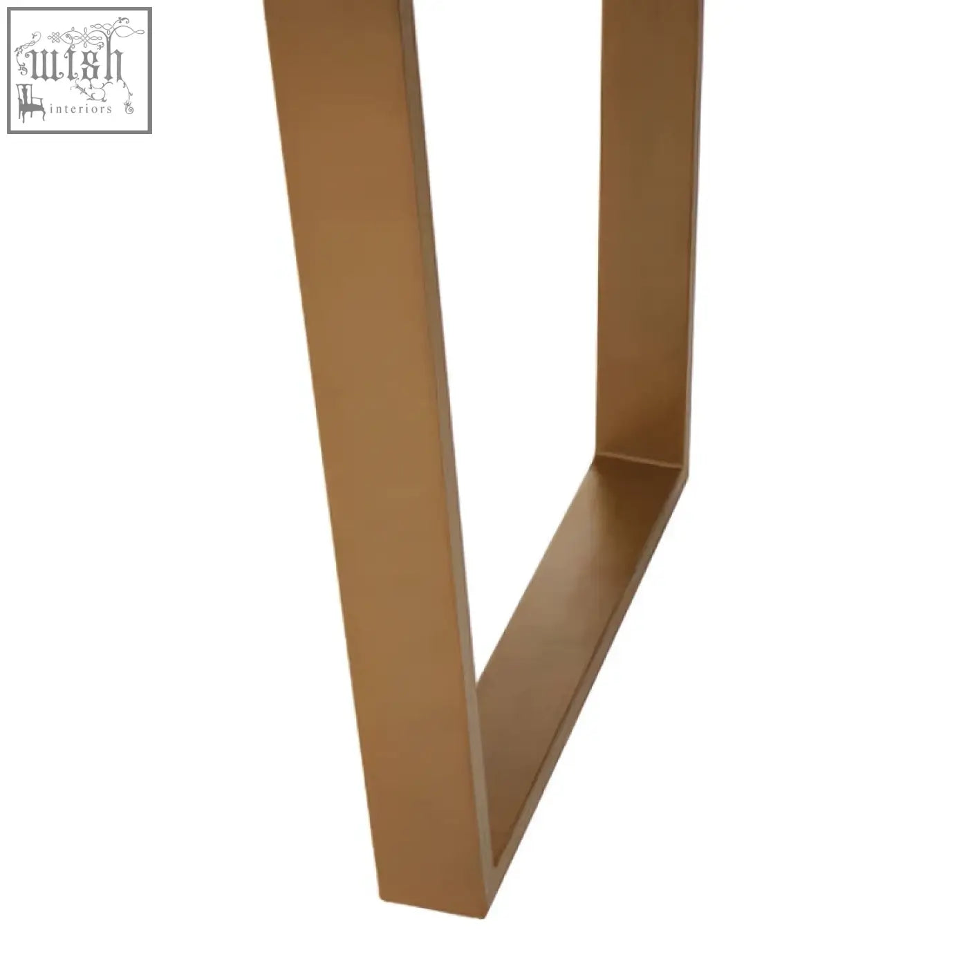 Gold-toned metal leg of varana black marble dining table with sleek modern design and black marble top