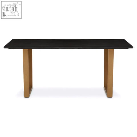 Varana black marble dining table with sleek black marble top and sturdy gold-toned metal legs for stylish meals