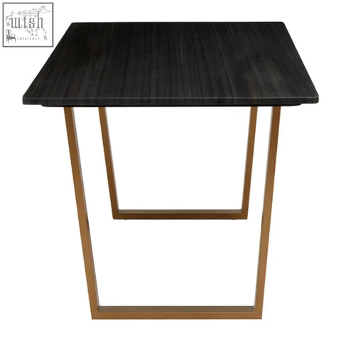 Varana black marble dining table with black marble top and gold-toned metal legs for stylish dining spaces