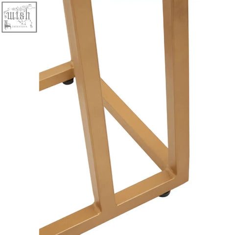 Gold finish frame metal table leg with sleek geometric design for varana black marble top side table