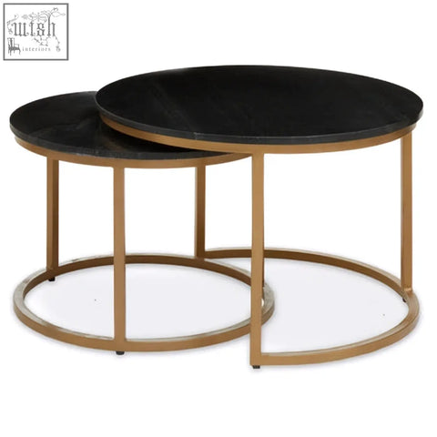 Set of two black marble round nesting coffee tables with gold-toned metal frames perfect for living rooms