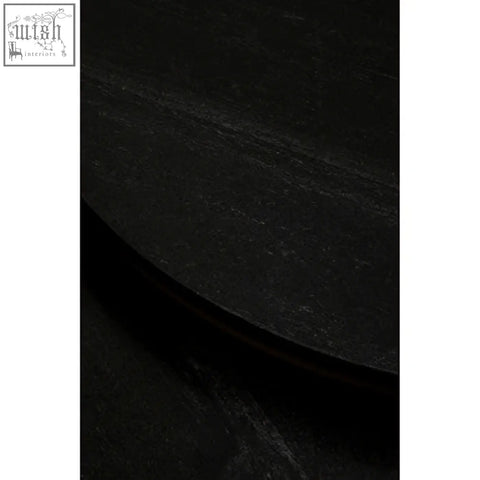 Varana nest of two black marble top round tables showing a black marble slate like surface with smooth rounded edge