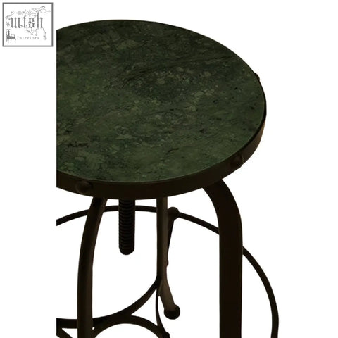 Dark green marble-top vasco black finish bar stool with black wrought iron legs and circular footrest