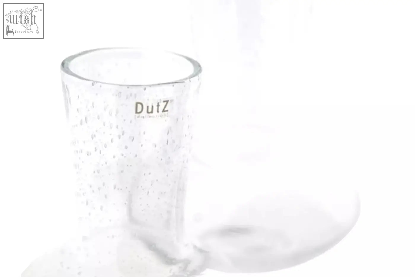 Clear glass tumbler mouth blown with textured bubble surface from dutz collection featuring dutz brand name