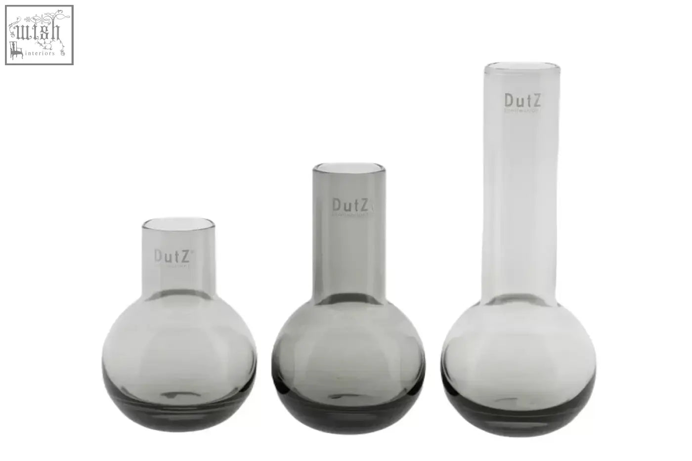 Set of three translucent gray mouth blown glass flasks from the dutz collection with dutz engraved on necks
