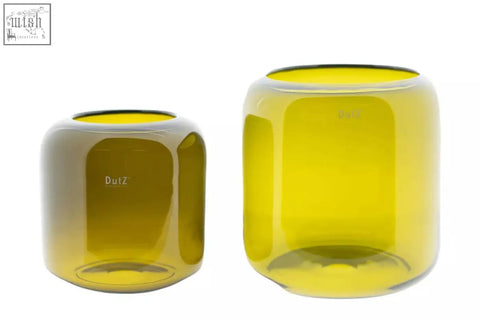 Two sleek mouth blown glass vases in yellow and amber hues from the dutz collection with dulz branding
