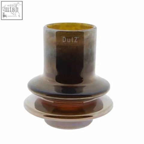 A sleek tiered glass vase from dutz collection with mouth blown amber to dark brown gradient and glossy gold luster finish