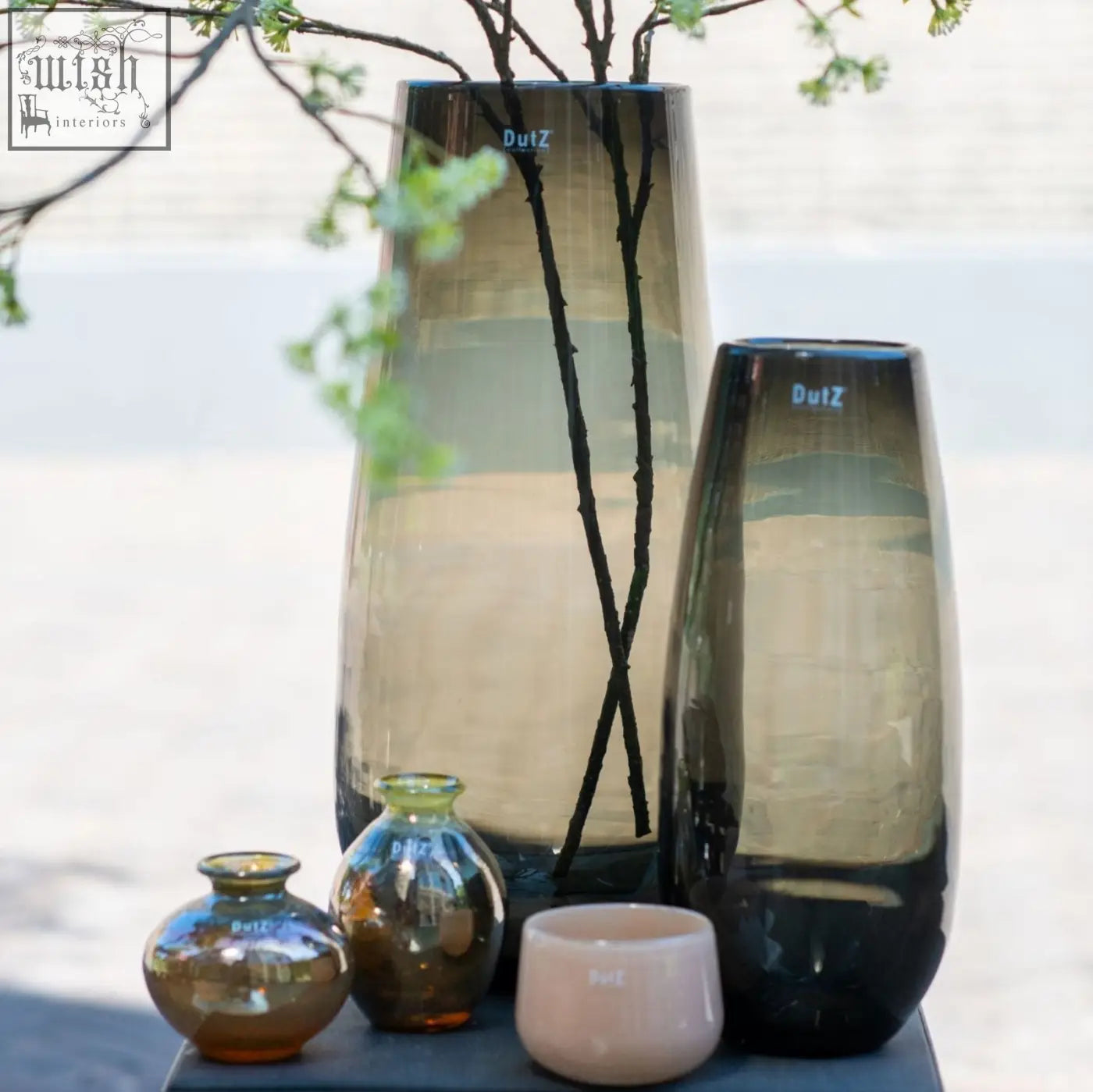 Tall sleek dutz glass vases in gradient amber and dark gray with mouth blown textured finish from dutz collection