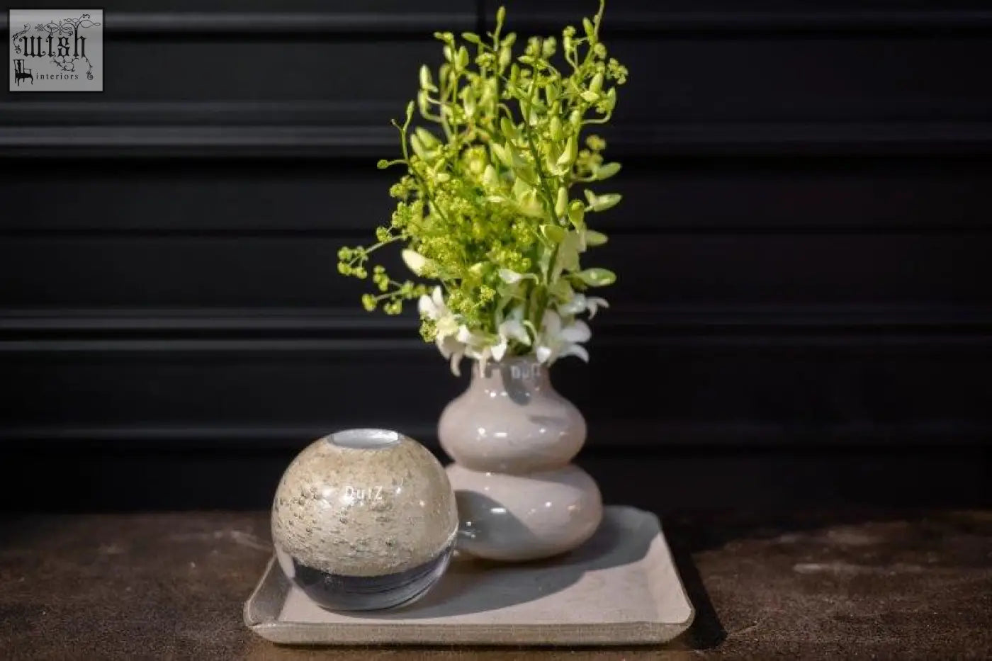 A sleek two-toned ceramic vase skrzyszow h16 d14 cm with green orchids from dutz collection mouth blown design