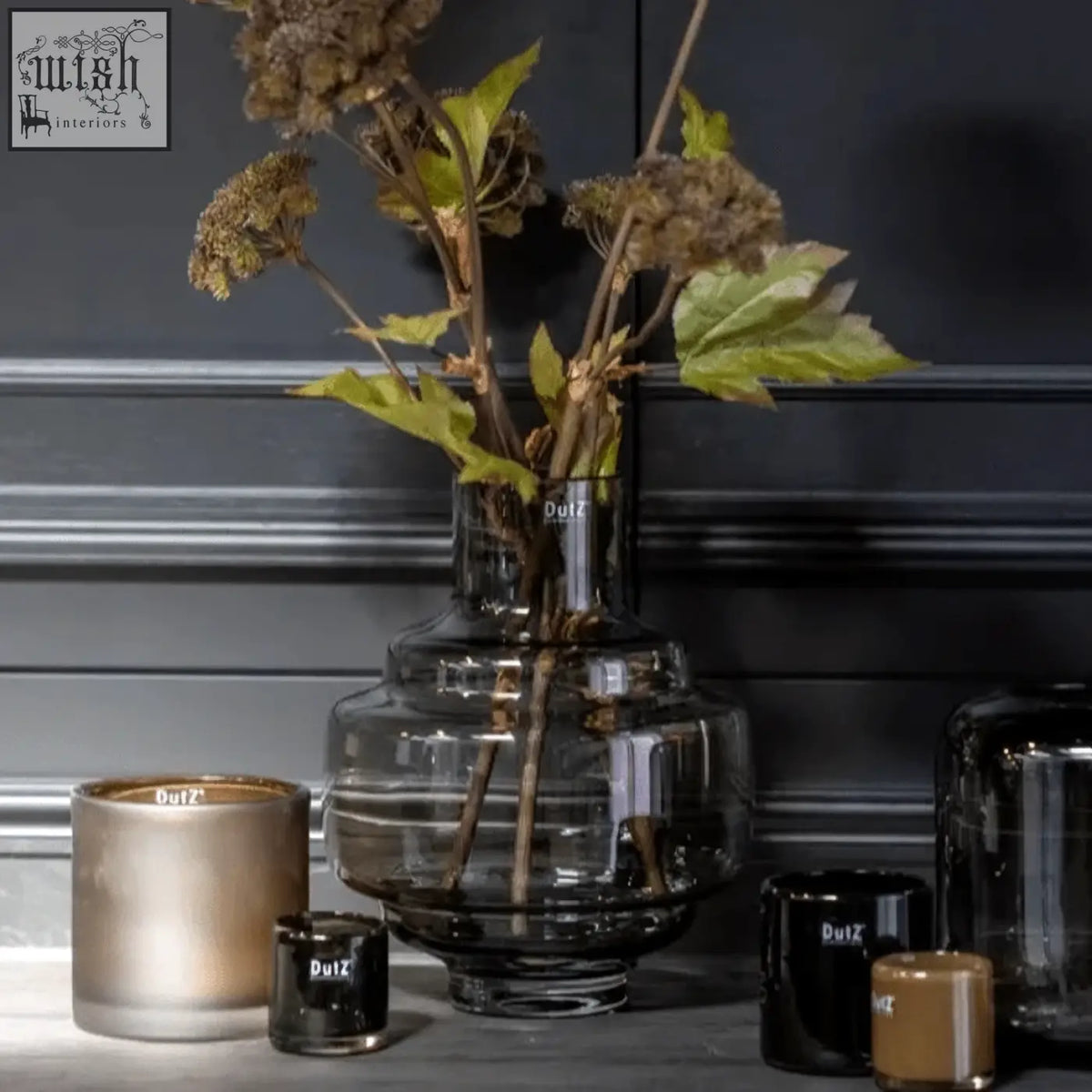 A sleek dark smoke glass vase with tiered design and ridges from the dutz collection mouth blown glass