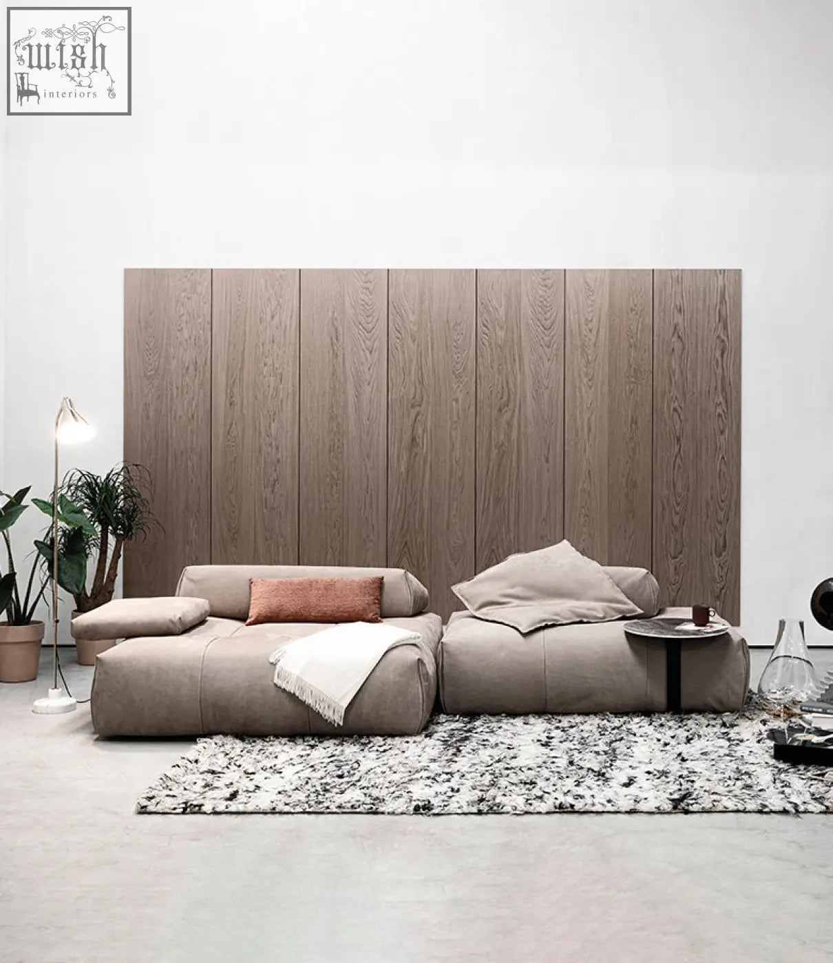 Beige vasquez three seater corner sofa with real leather upholstery and rust accent pillow perfect for style and shipping cost savings