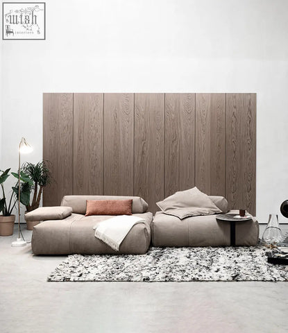 Beige vasquez three seater corner sofa with real leather upholstery and rust accent pillow perfect for style and shipping cost savings