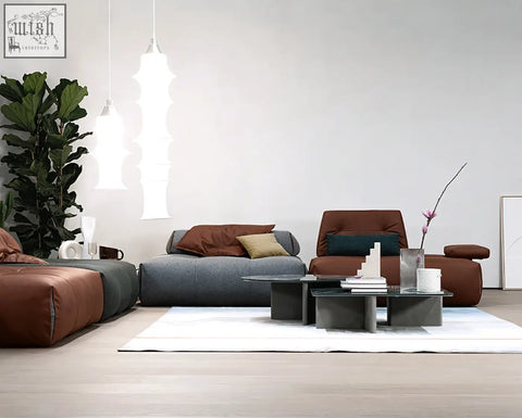 Modern minimalist vasquez three seater corner sofa in gray and brown real leather with earthy throw pillows and low shipping cost