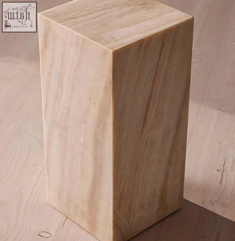 A sleek beige marble plinth with subtle veining in minimalist design perfect as a side table with offer financing