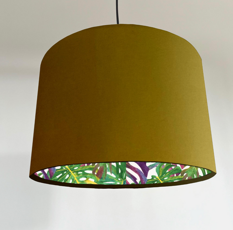 Olive green velvet double sided drum lampshade with vibrant tropical leaf pattern ceiling light shade uk handcrafted