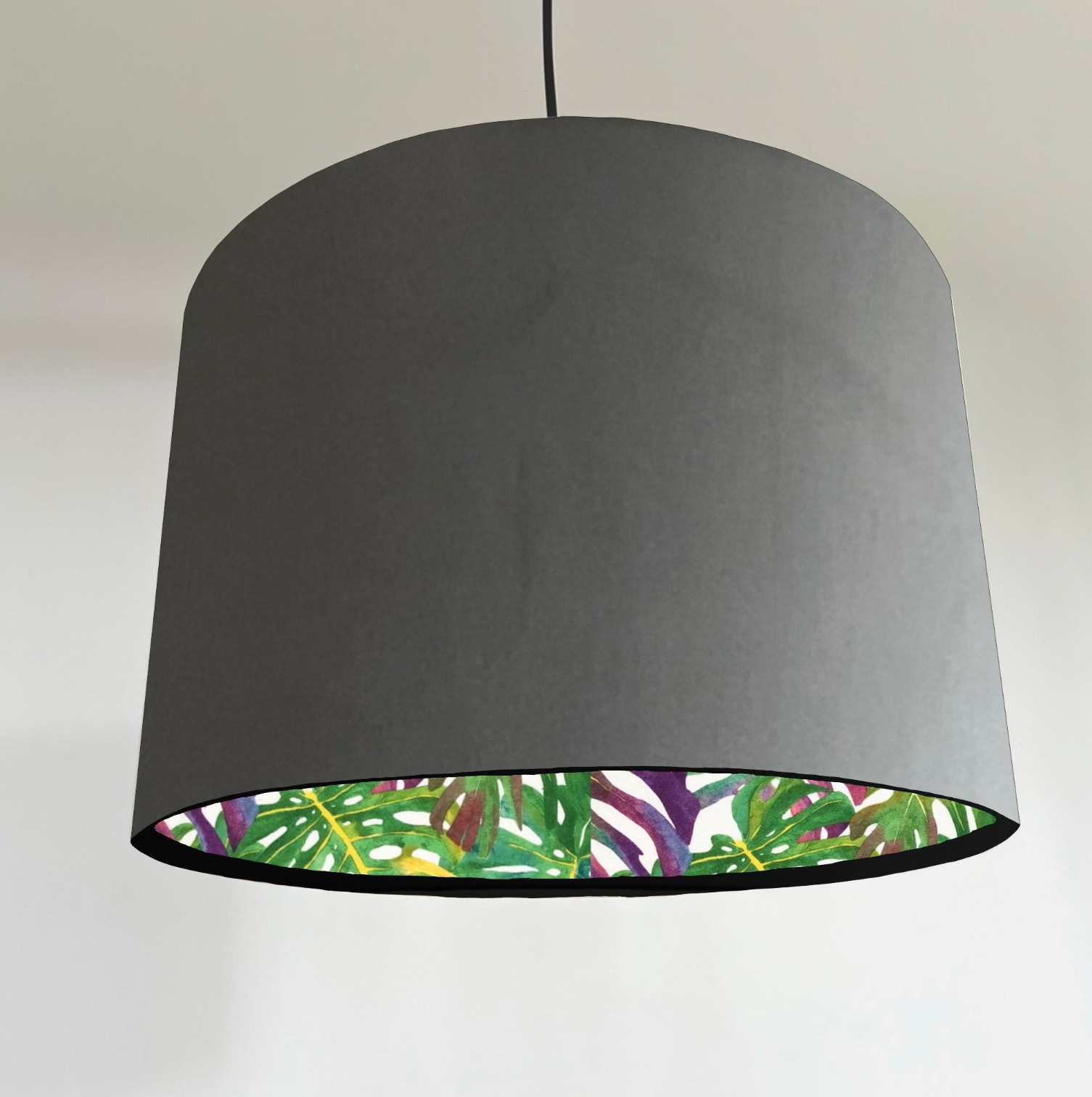 Gray velvet double sided drum lampshade with vibrant multicoloured tropical leaves lining for ceiling light shade