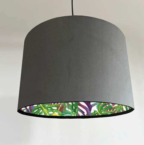 Gray velvet double sided drum lampshade with vibrant multicoloured tropical leaves lining for ceiling light shade