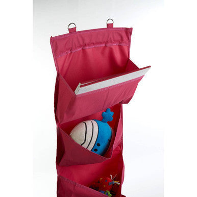Pink fabric over the door organizer with multiple compartments holding toys and a book verti over door hot pink 4 tier hanging organiser