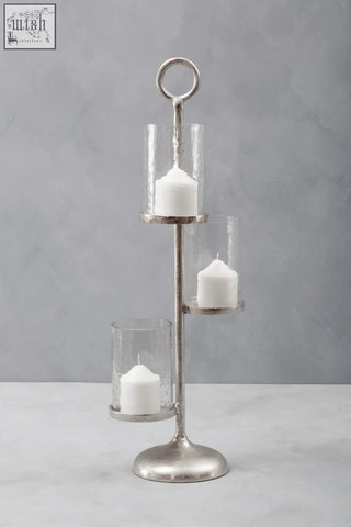 Silver-toned verve floor standing 3-light candle holder with three tiers clear glass cylinders and white candles