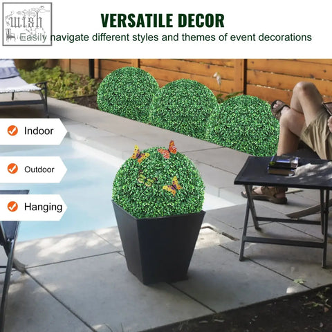 Green vevor artificial topiary balls in black pots with colorful butterfly decorations for all-year decor