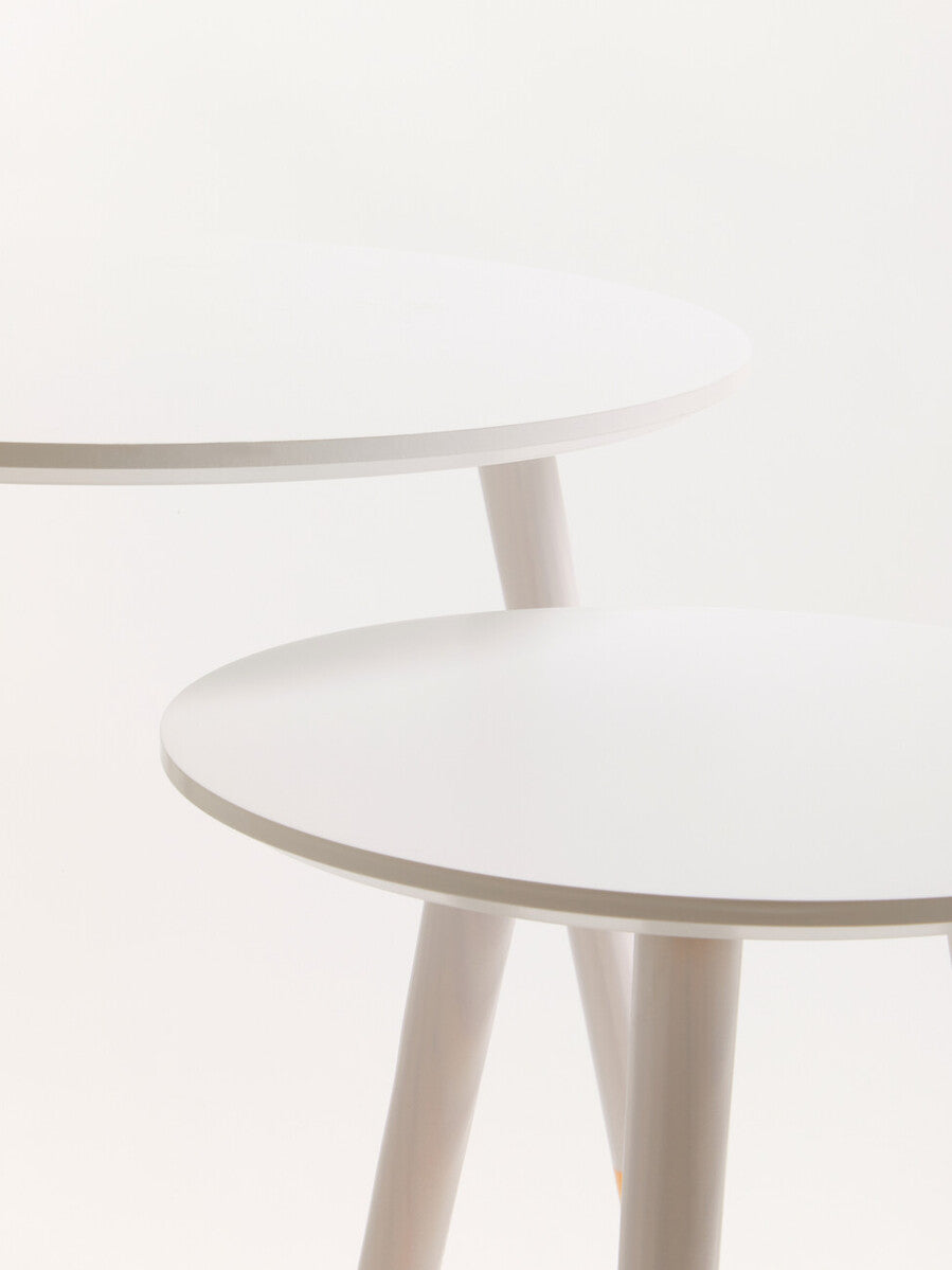 Minimalist viborg set of two white round side tables with slender tapered legs perfect for small spaces