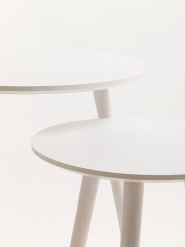 Minimalist viborg set of two white round side tables with slender tapered legs perfect for small spaces