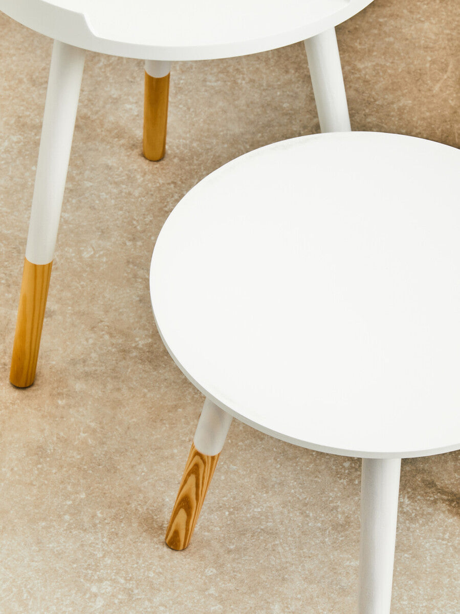 Viborg set of two white round side tables with slender natural wood finish legs perfect for modern living spaces