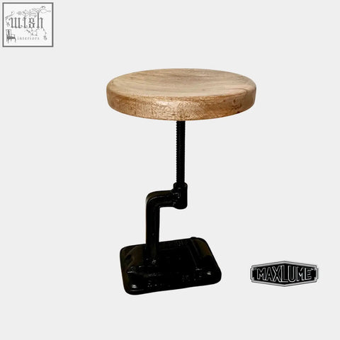 Rustic vice clamp industrial bar stool with light wood seat and black cast iron adjustable height base