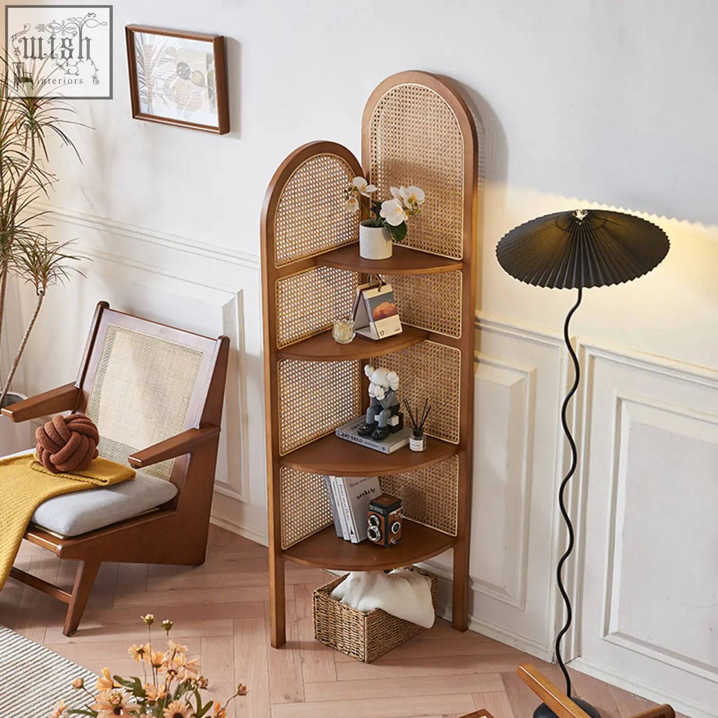 Wooden vicente triangle bookshelf with arched cane panels and curved shelves made from ash wood displaying decor