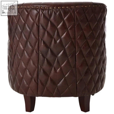 Brown leather tufted ottoman with diamond quilted pattern and studded trim for victor brown leather winged back armchair