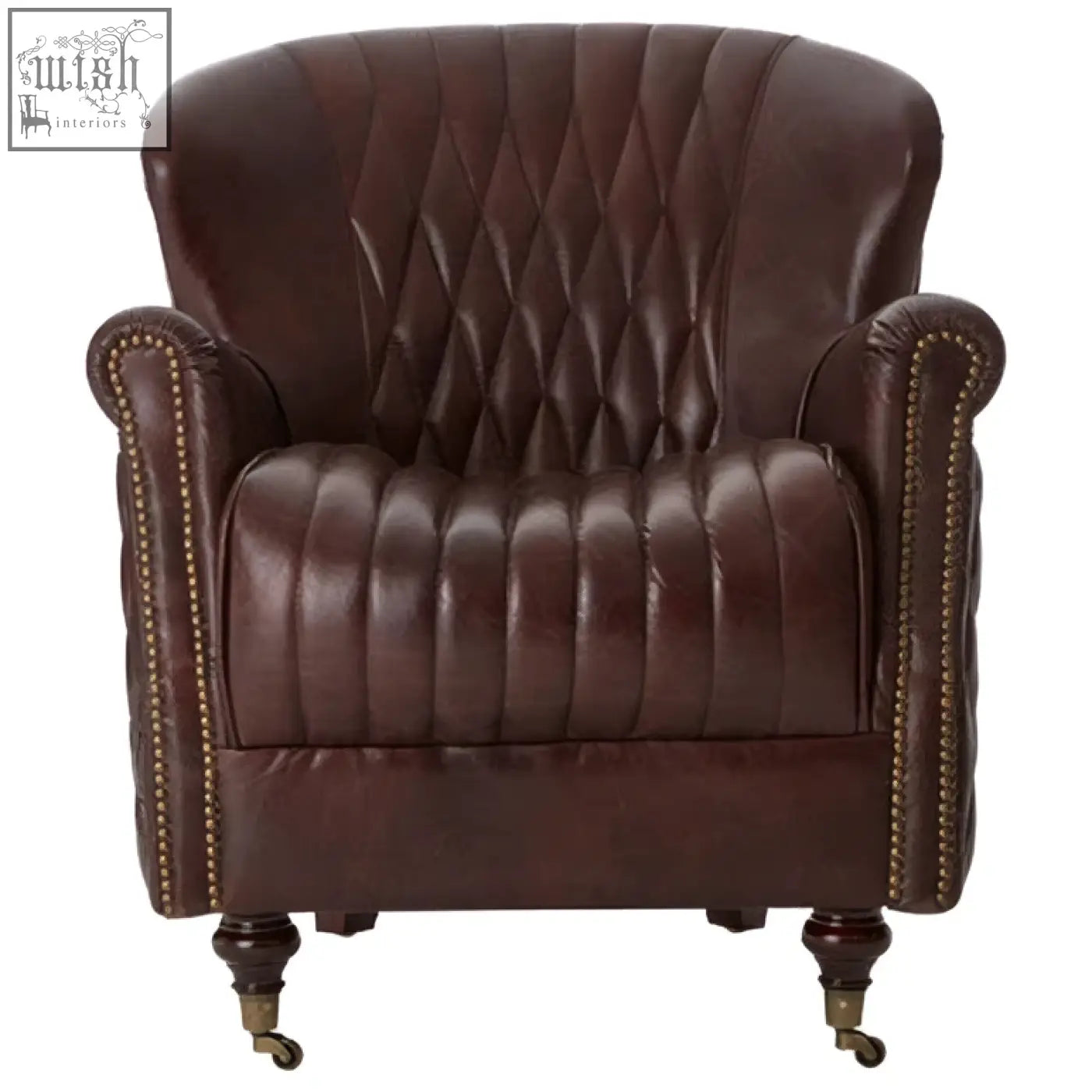 Victor brown leather winged back armchair with diamond-quilted back, curved arms, brass nailhead trim, and casters