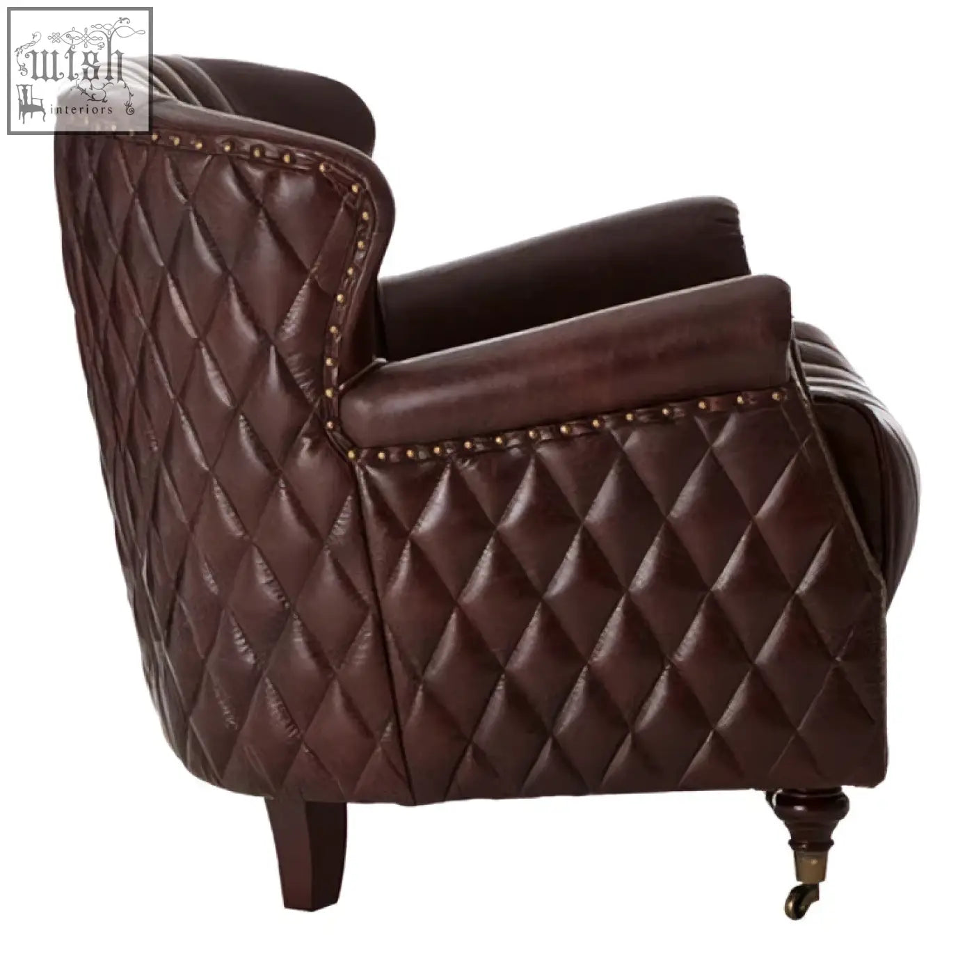 Victor brown leather winged back armchair with brown leather quilted diamond pattern and curved arms with nailhead trim