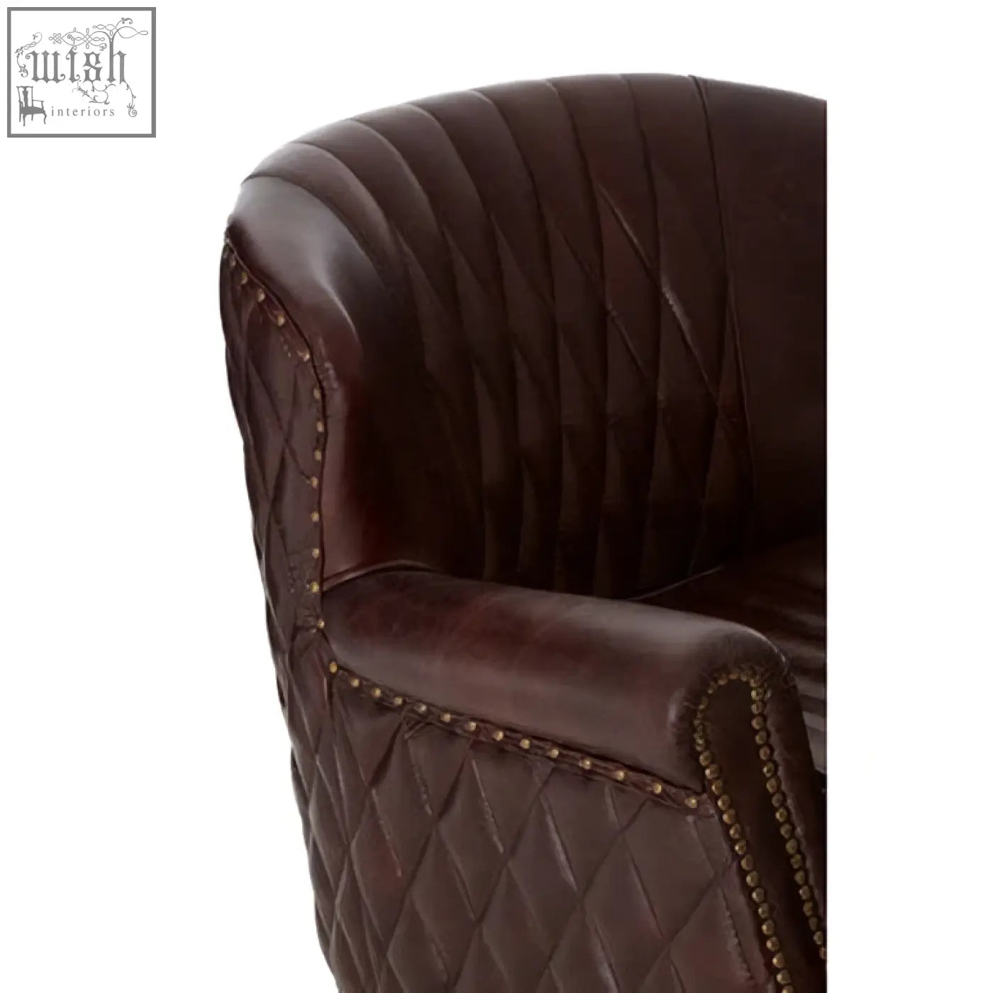 Victor brown leather winged back armchair with dark brown leather, quilted diamond stitching, curved arms, and brass trim