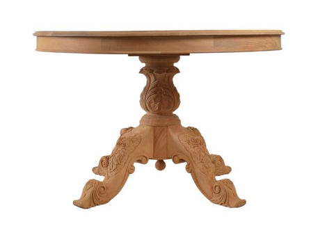 Victorian round dining table made of light oak wood with hand made ornate carved legs and floral motifs on central column