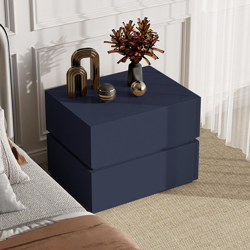 Modern navy blue vida designs bedside table with glossy finish and stacked cube design perfect for bedrooms