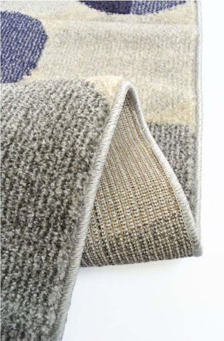 Gray and beige villa blue abstract rug with subtle blue circular pattern perfect for stylish living spaces